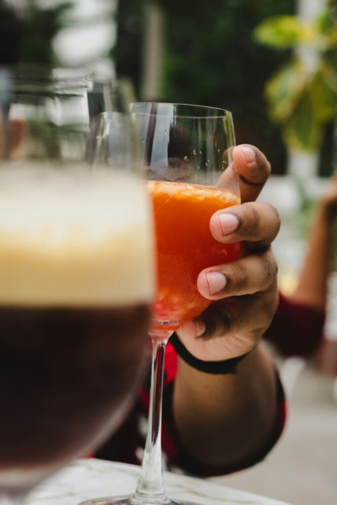 https://unsplash.com/photos/a-close-up-of-a-person-holding-a-wine-glass-ynTzFuNCyHA